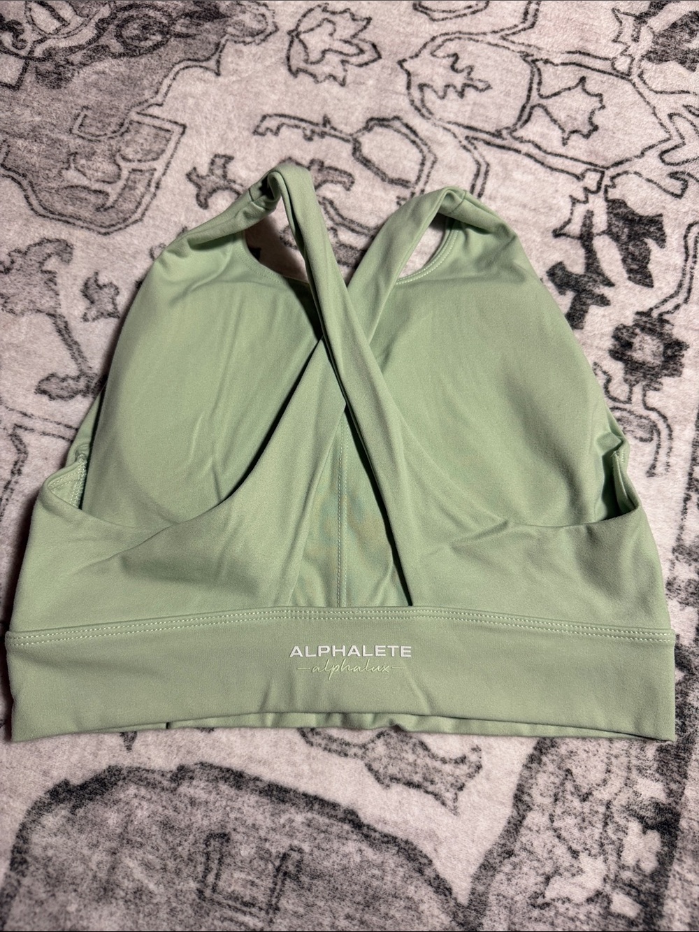 Alphalete Sage Green Twist-Back sports bra